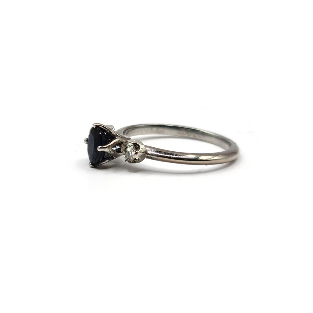 18ct white gold ring featuring 0.70 carat and 0.30 carat sapphires, showcasing a sparkling gemstone design.