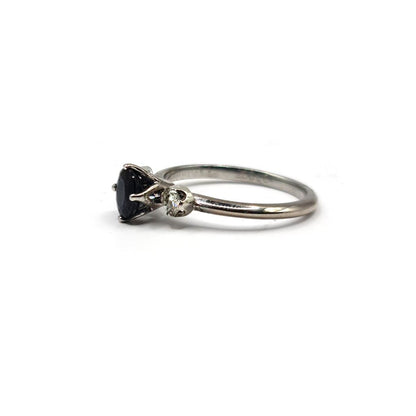 18ct white gold ring featuring 0.70 carat and 0.30 carat sapphires, showcasing a sparkling gemstone design.