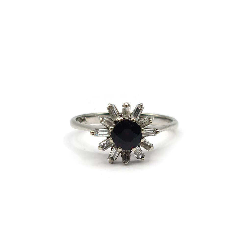 18ct white gold diamond cluster ring with 0.81 carats of sparkling diamonds on a sleek band.