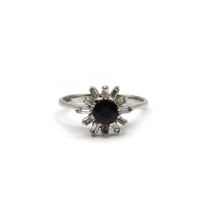 18ct white gold diamond cluster ring with 0.81 carats of sparkling diamonds on a sleek band.