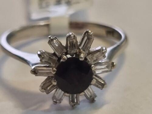 18ct white gold diamond cluster ring with 0.81 carats of sparkling diamonds, showcasing a luxurious, elegant jewelry piece.