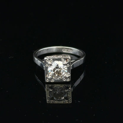 18ct white gold diamond ring with 0.89ct diamonds, size L, featuring a sleek band and elegant sparkle.