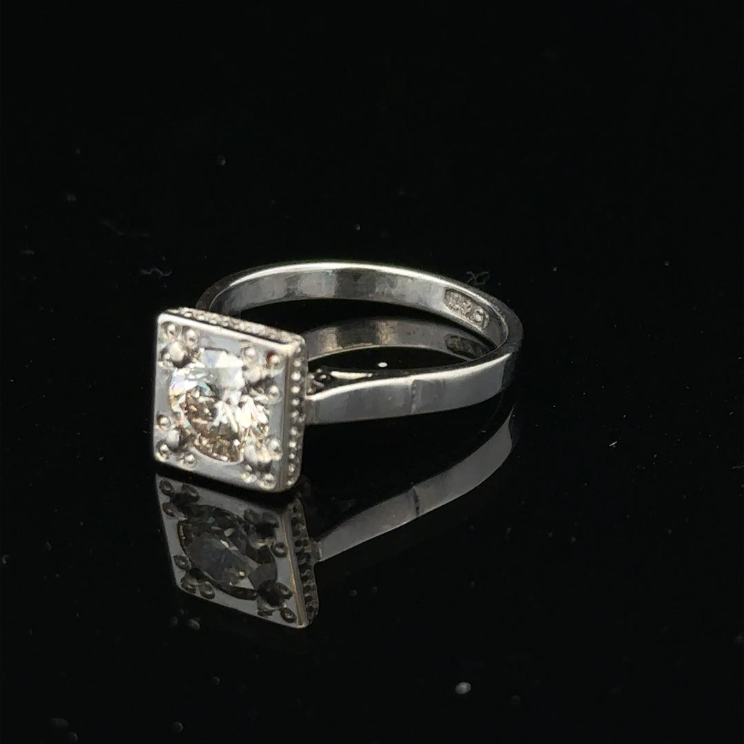 18ct white gold diamond ring with 0.89ct diamonds, size L, 3.9g, featuring a sleek, elegant design.