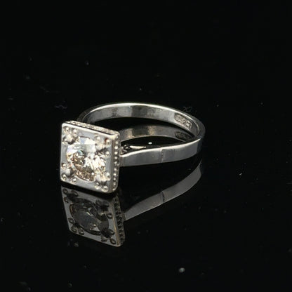 18ct white gold diamond ring with 0.89ct diamonds, size L, 3.9g, featuring a sleek, elegant design.