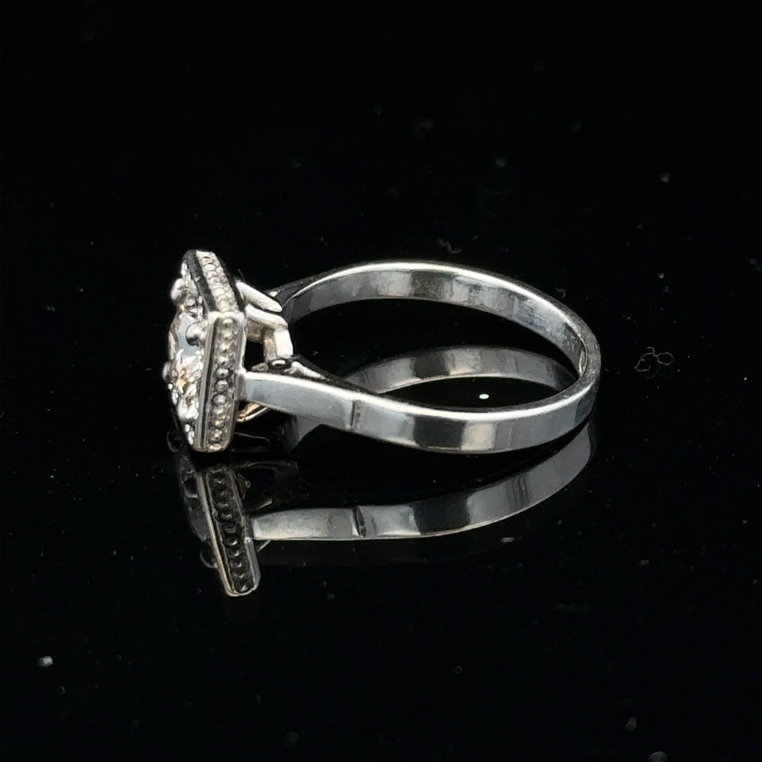 18ct white gold diamond ring with 0.89ct diamonds in size L, featuring a sleek design and weighing 3.9g.