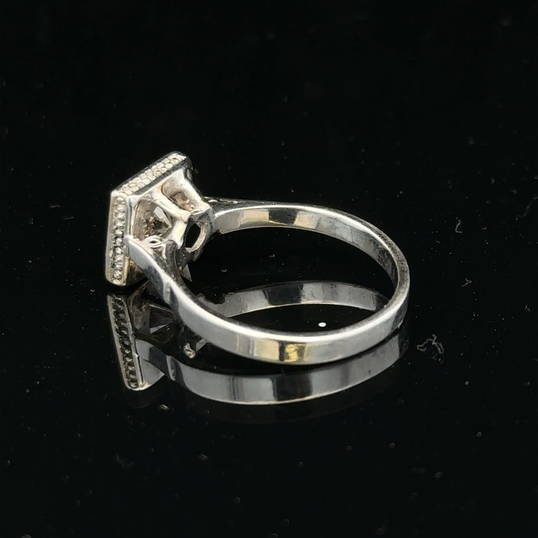 18ct white gold diamond ring with 0.89ct diamonds, size L, elegant jewelry piece with 3.9g weight.
