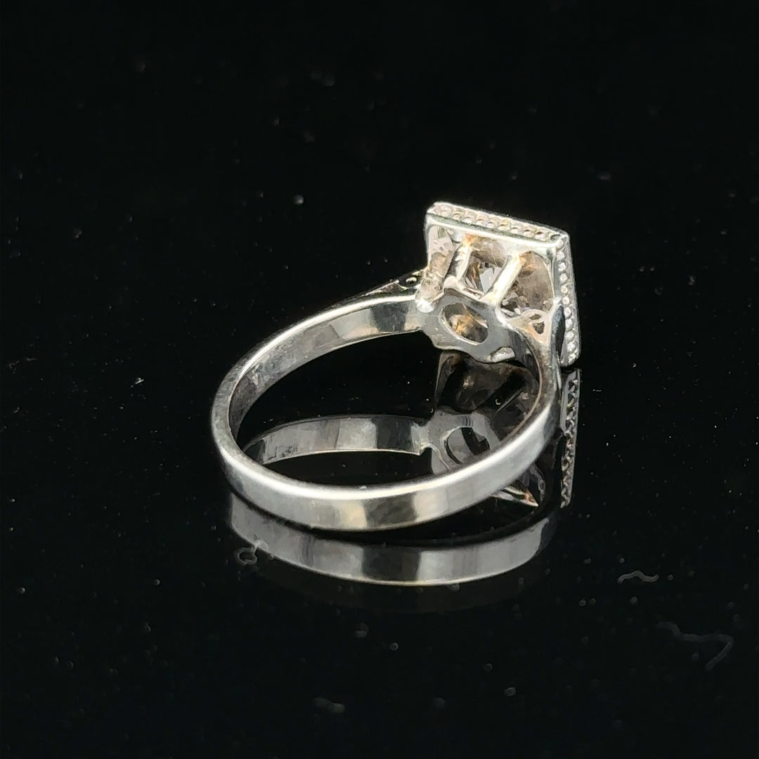 18ct white gold diamond ring with 0.89ct diamonds, size L, 3.9g, unbranded jewelry displayed on a white background.