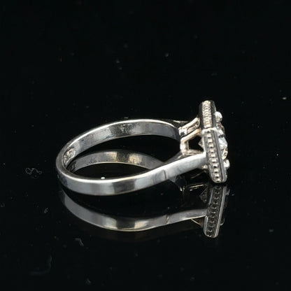 18ct white gold diamond ring with 0.89ct diamonds, size L, 3.9g, featuring a sleek band and sparkling gemstone details.