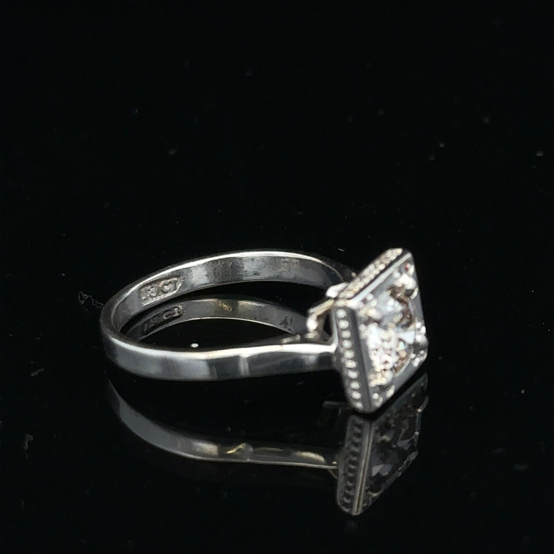 18ct white gold diamond ring with 0.89ct diamonds, size L, 3.9g, unbranded jewelry displaying the elegant design.