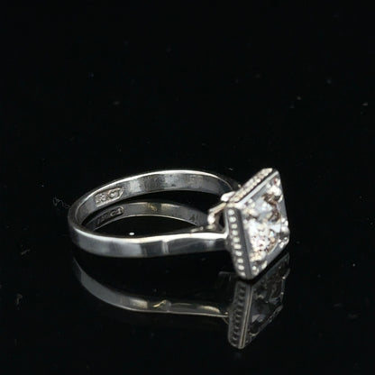 18ct white gold diamond ring with 0.89ct diamonds, size L, 3.9g, unbranded jewelry displaying the elegant design.