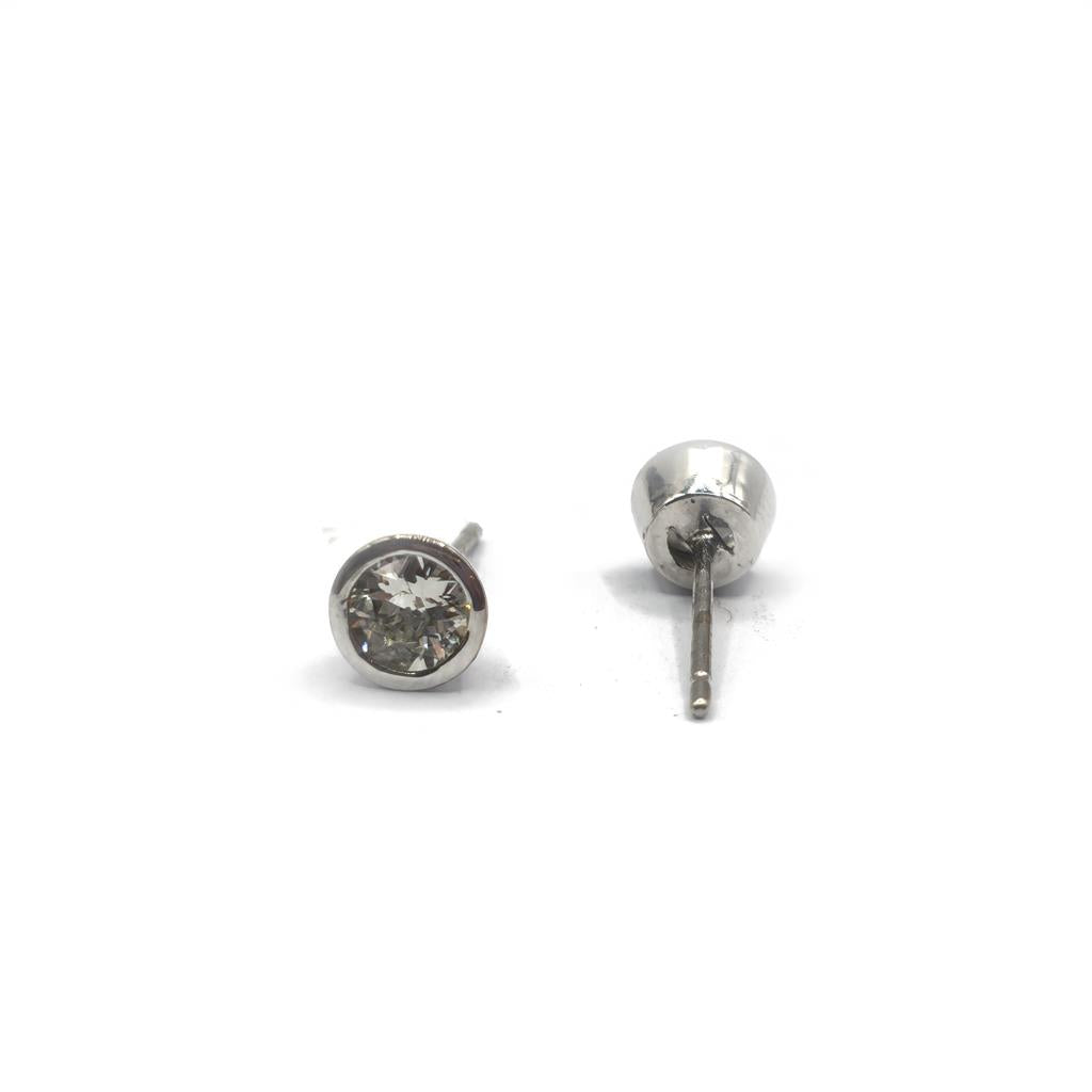 18ct white gold diamond stud earrings with 0.90 carats of sparkling diamonds, showcasing elegant jewelry design.
