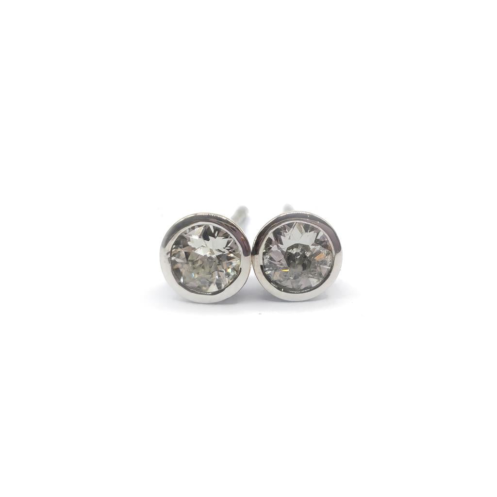 18ct white gold diamond stud earrings with 0.90 carats of sparkling diamonds on a sleek, classic design.