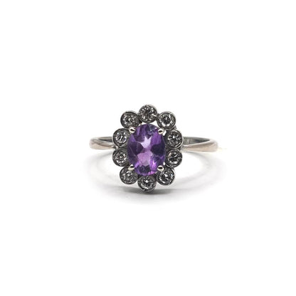 18ct white gold amethyst and diamond ring with 1.00 carat amethyst and 0.30 carat diamonds, size P1/2, showcasing a elegant gemstone design
