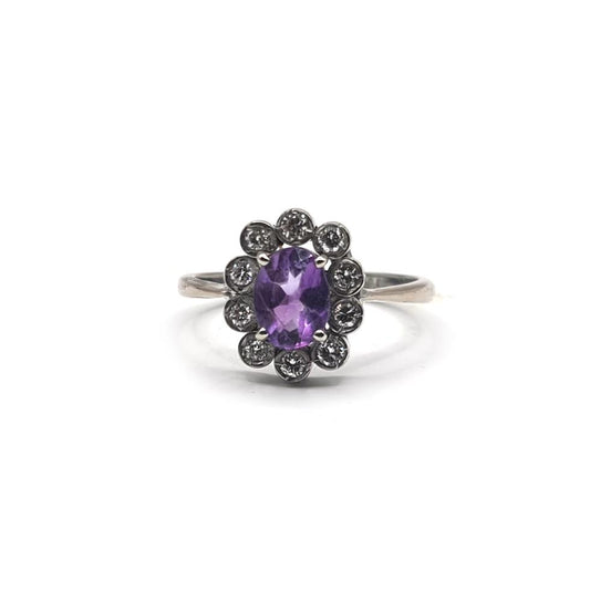 18ct white gold amethyst and diamond ring with 1.00 carat amethyst and 0.30 carat diamonds, size P1/2, showcasing a elegant gemstone design