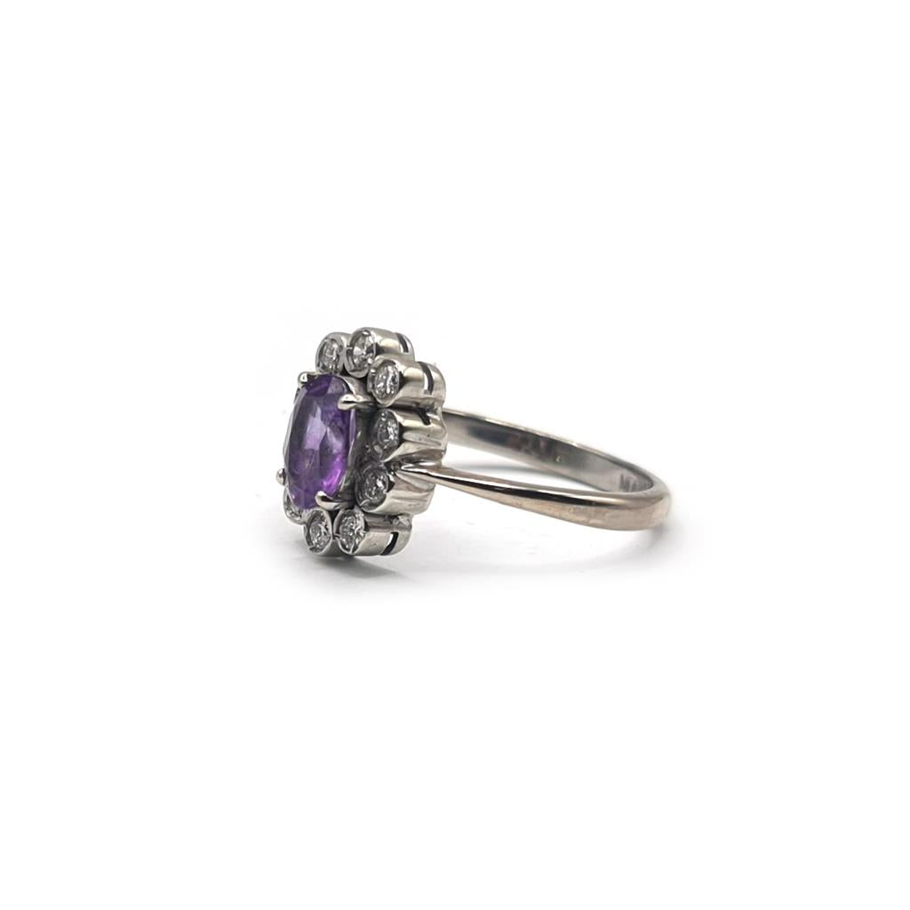 18ct white gold ring with 1.00ct amethyst and 0.30ct diamond, size P1/2, featuring a stunning gemstone setting.