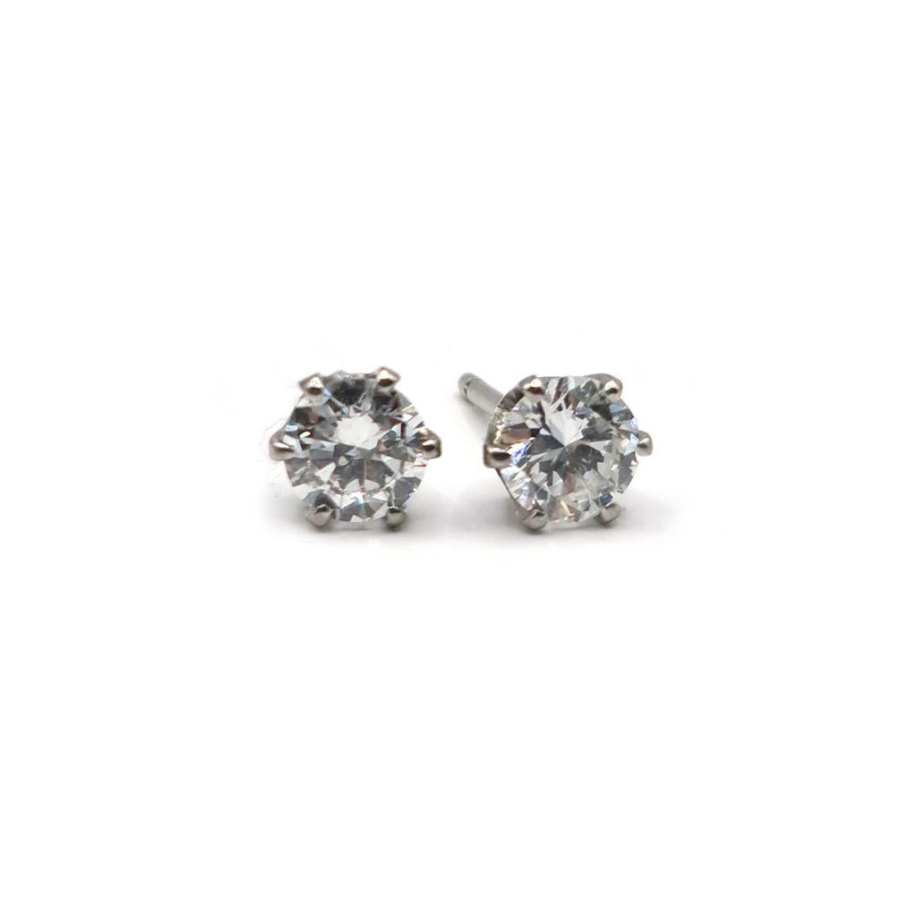 18ct white gold diamond stud earrings with 1.09 carat single stone diamonds, featuring classic and elegant jewelry design.