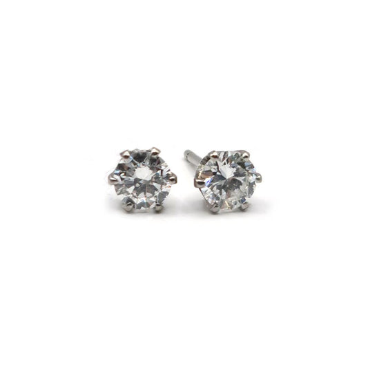 18ct white gold diamond stud earrings with 1.09 carat single stone diamonds, featuring classic and elegant jewelry design.