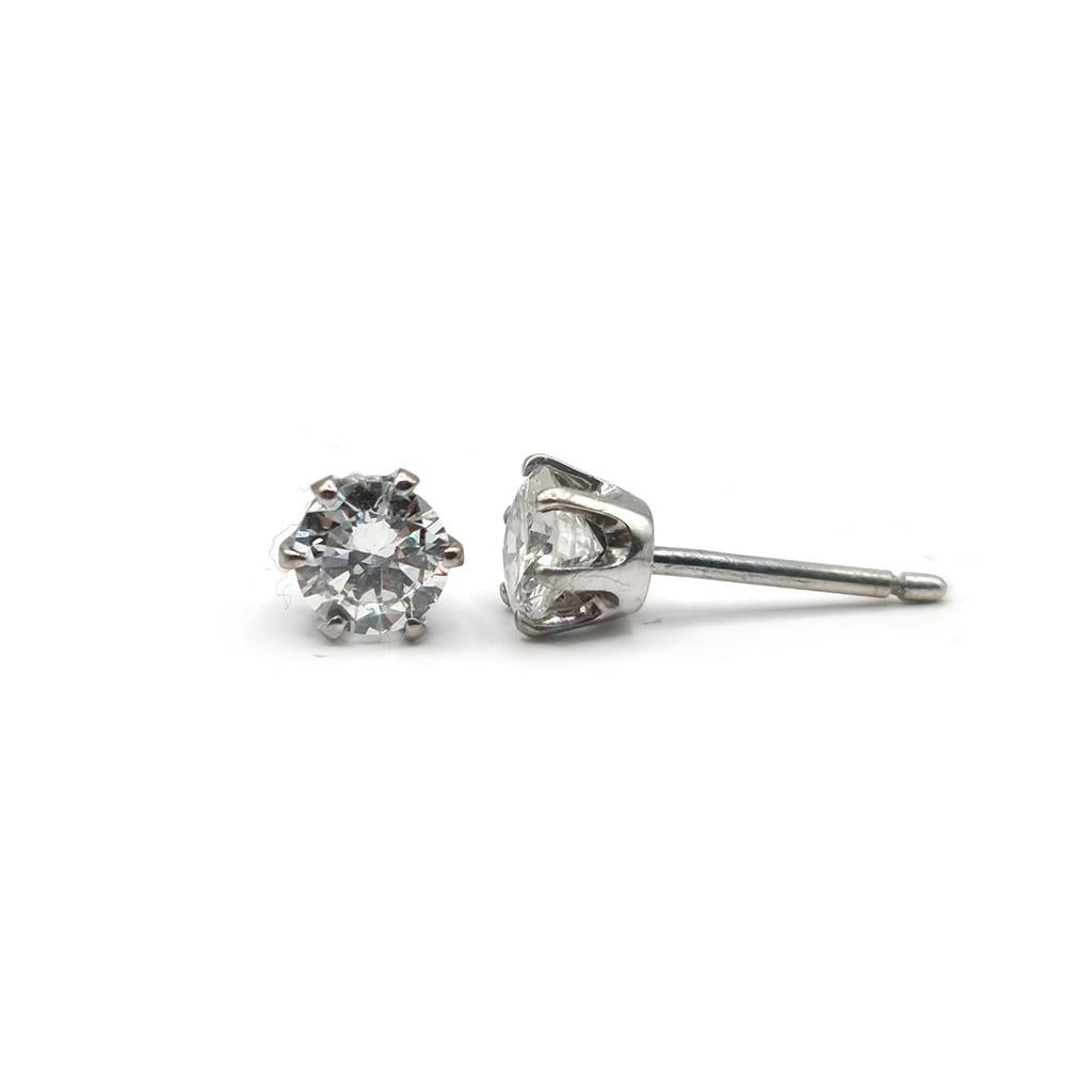 18ct white gold diamond stud earrings with a 1.09 carat single stone, featuring sparkling diamonds on a classic earring setting.