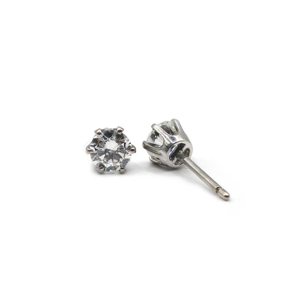 18ct white gold diamond stud earrings with 1.09 carat single stone design, featuring sparkling diamonds on a sleek gold setting.