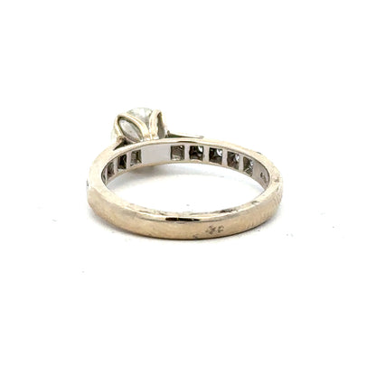 18ct white gold diamond ring with 1.135 carats, colour I, clarity SI1, featuring a sparkling central diamond.
