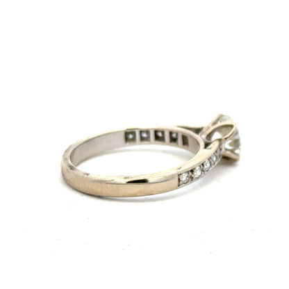 18ct white gold diamond ring with 1.135 carats, Colour I, Clarity SI1, showcasing a sparkling central diamond.