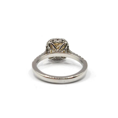 18ct white gold ring featuring a 1.15 carat fancy yellow diamond and additional 0.60 carat diamonds with VS1 clarity.