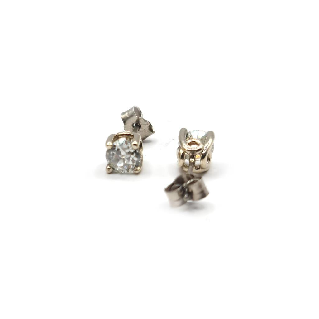 18ct white gold diamond earrings with 1.17 carats of sparkling diamonds, elegant jewelry piece with a classic design.