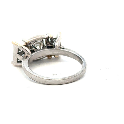 18ct white gold diamond ring with 1.35 carats, featuring a sparkling central diamond and elegant band design.