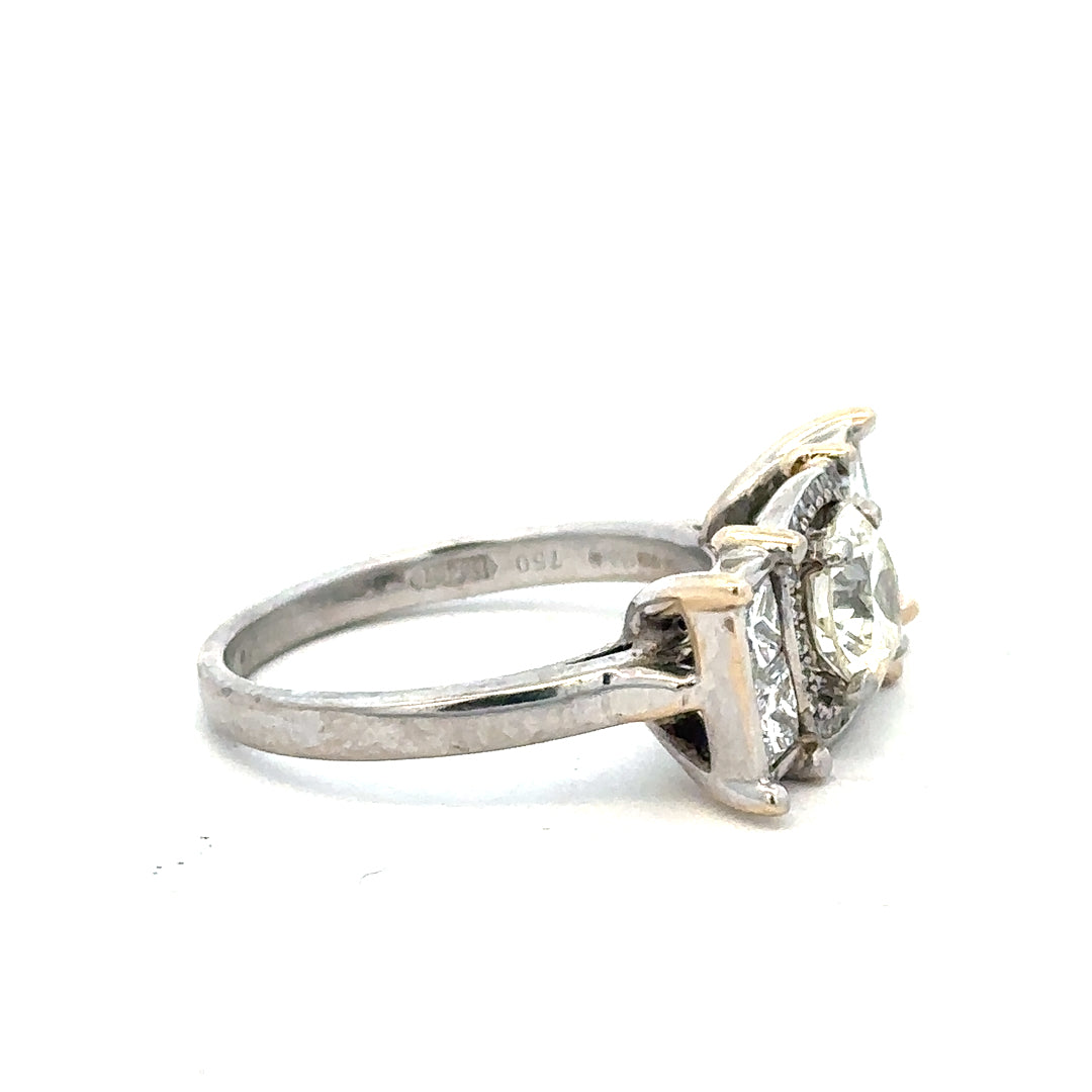 18ct white gold diamond ring with 1.35 carats of sparkling diamonds, elegant jewelry piece with a sleek design.