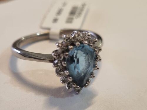 18ct white gold ring featuring a 1.90 carat pear-shaped topaz and 0.40 carat diamond accent, elegant jewelry design.