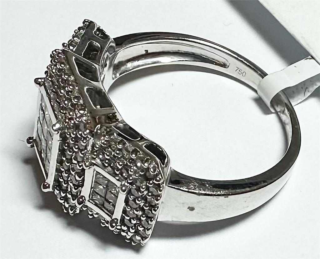 18ct white gold diamond ring with 1 carat center stone in size Q1/2, showcasing a sparkling solitaire design.