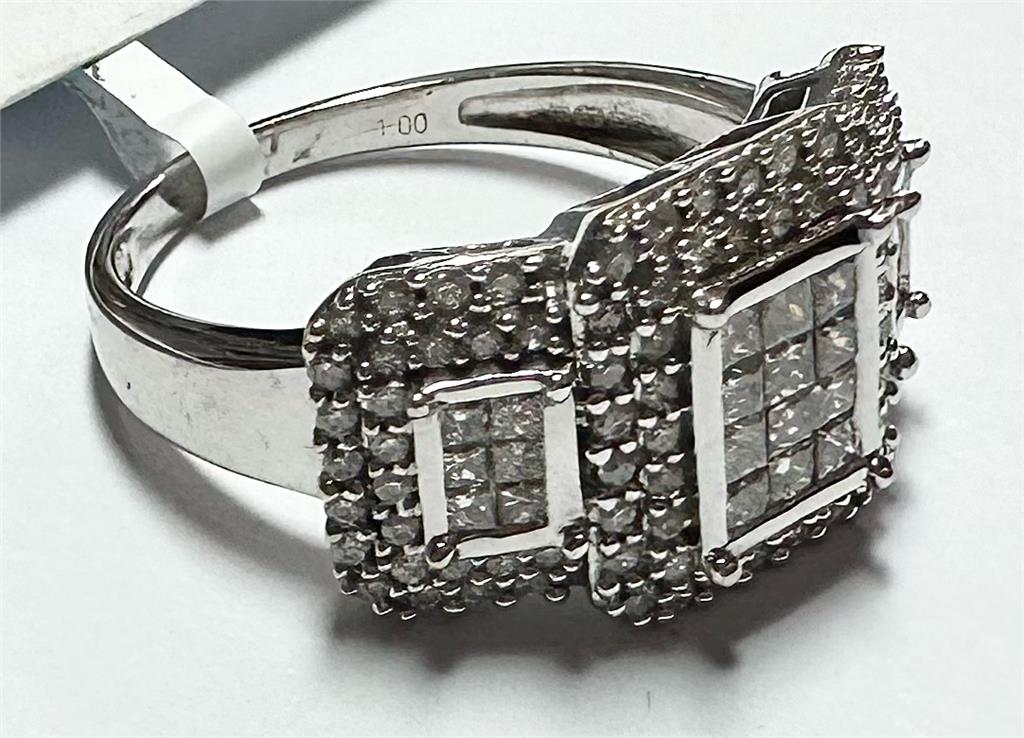 18ct white gold diamond ring with 1 carat center stone, size Q1/2, featuring a sleek, elegant design.