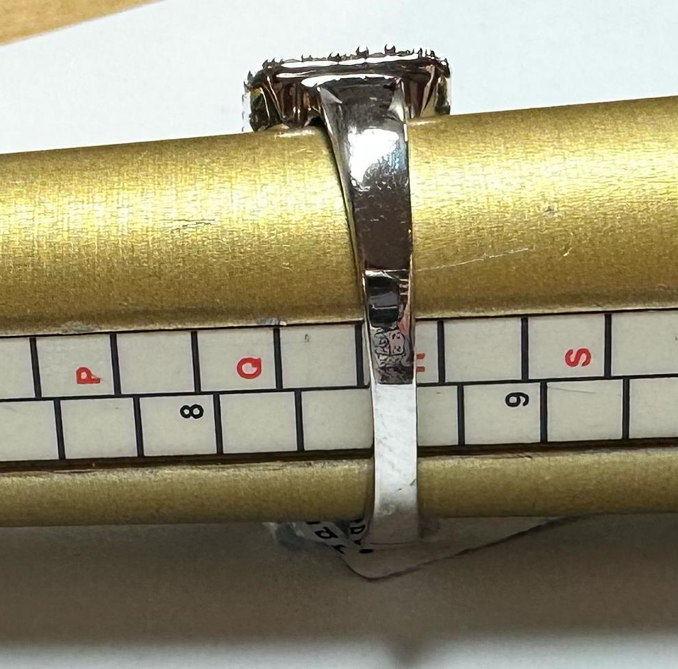 18ct white gold diamond ring with 1 carat center stone, size Q½, featuring elegant design and sparkling brilliance.