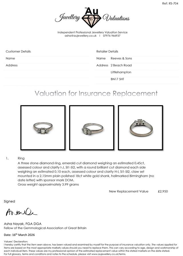 18ct white gold ring with three sparkling diamonds, elegant jewelry piece showing the detailed band and gemstone setting.