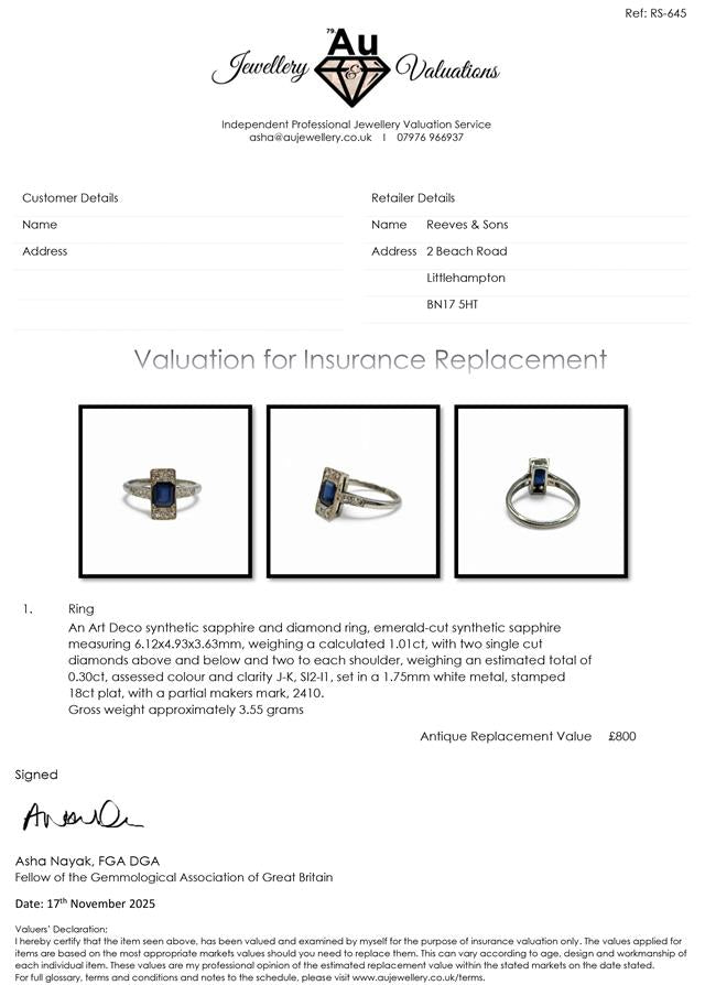 18ct white gold and platinum diamond and sapphire ring with a detailed design, featuring sparkling gemstones.