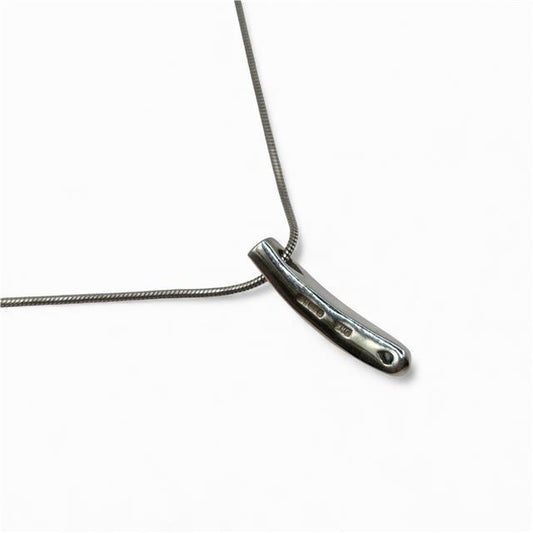 18ct white gold chain with diamond pendant, showcasing a sparkling diamond set in a delicate gold setting.