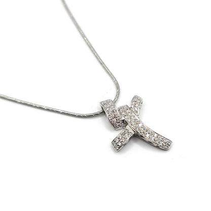 18ct white gold chain with 0.65 carat diamond twist cross pendant, elegant jewelry piece with sparkling diamonds.