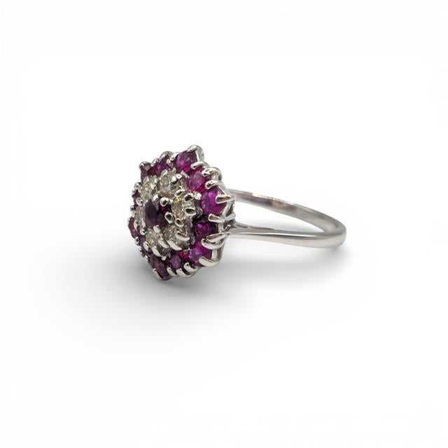 18ct white gold diamond and ruby ring with sparkling gemstones, featuring a classic design and elegant craftsmanship.