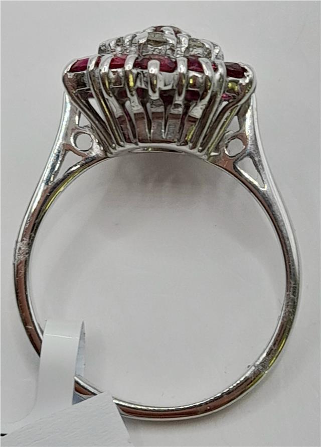 18ct white gold diamond and ruby ring featuring sparkling diamonds and vibrant rubies in an elegant design.