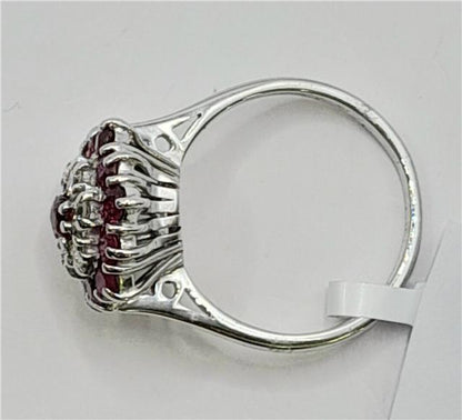 18ct white gold diamond and ruby ring with sparkling diamonds and vibrant rubies, elegant jewelry centerpiece.
