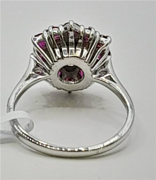 18ct white gold ring with sparkling diamonds and vibrant rubies, featuring an elegant design and unbranded craftsmanship.
