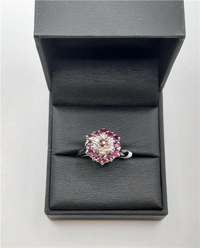 18ct white gold diamond and ruby ring featuring sparkling diamonds and vibrant rubies, elegant jewelry piece.