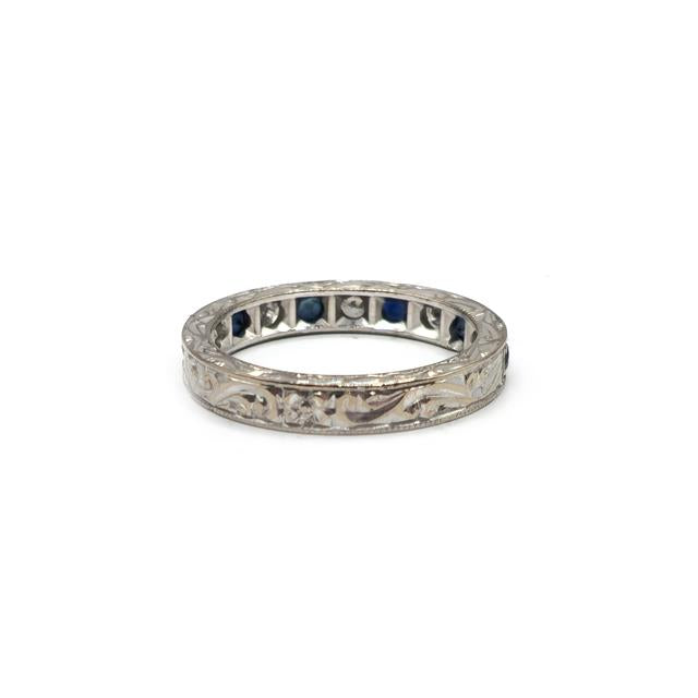 18ct white gold diamond and sapphire half eternity ring with alternating gemstones, elegant and sparkling jewelry design.