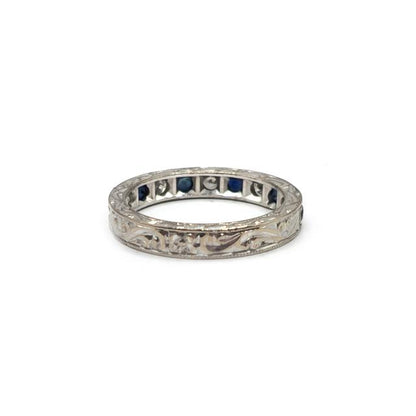 18ct white gold diamond and sapphire half eternity ring with alternating gemstones, elegant and sparkling jewelry design.