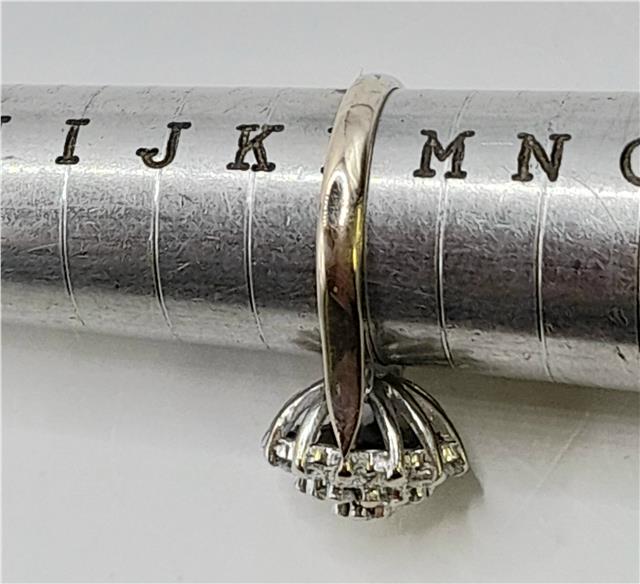 18ct white gold diamond cluster ring, size L, featuring a sparkling diamond design, unbranded jewelry image.