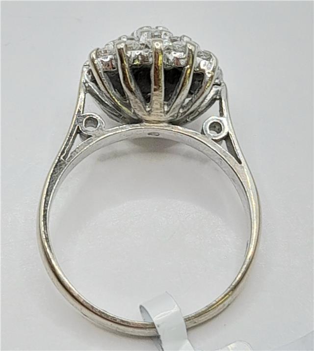 18ct white gold diamond cluster ring, size L, featuring sparkling diamonds in a luxurious design.