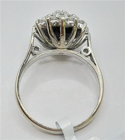 18ct white gold diamond cluster ring, size L, featuring sparkling diamonds in a luxurious design.