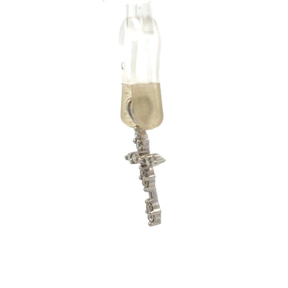 18ct white gold diamond cross pendant, 0.8g, featuring sparkling diamonds on a sleek unbranded jewelry piece.