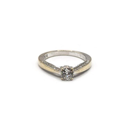 18ct white gold diamond ring with sparkling diamonds, showcasing elegant design and craftsmanship.