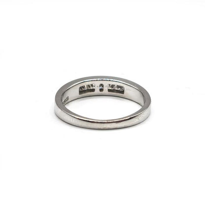 18ct white gold diamond ring featuring a sparkling central diamond and elegant band design.